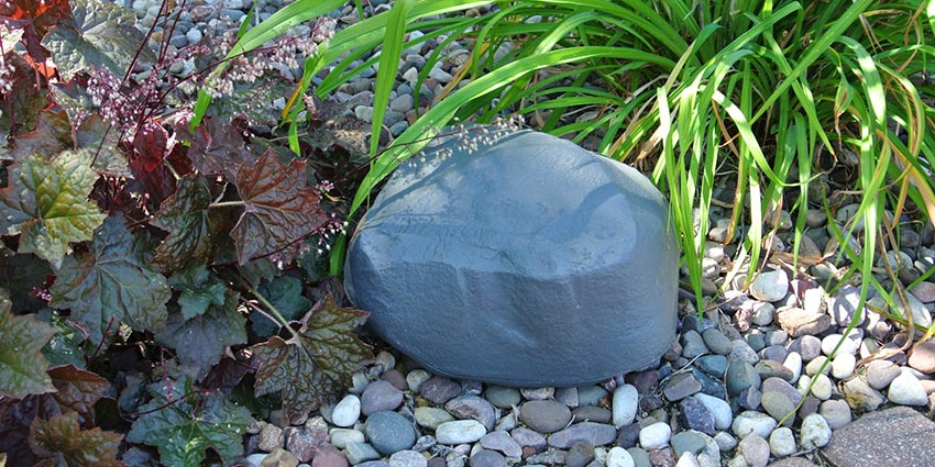 Bell PROTECTA EVO Landscape tamper-resistant rodent bait station used by Janus Pest Management for discreet commercial rodent control